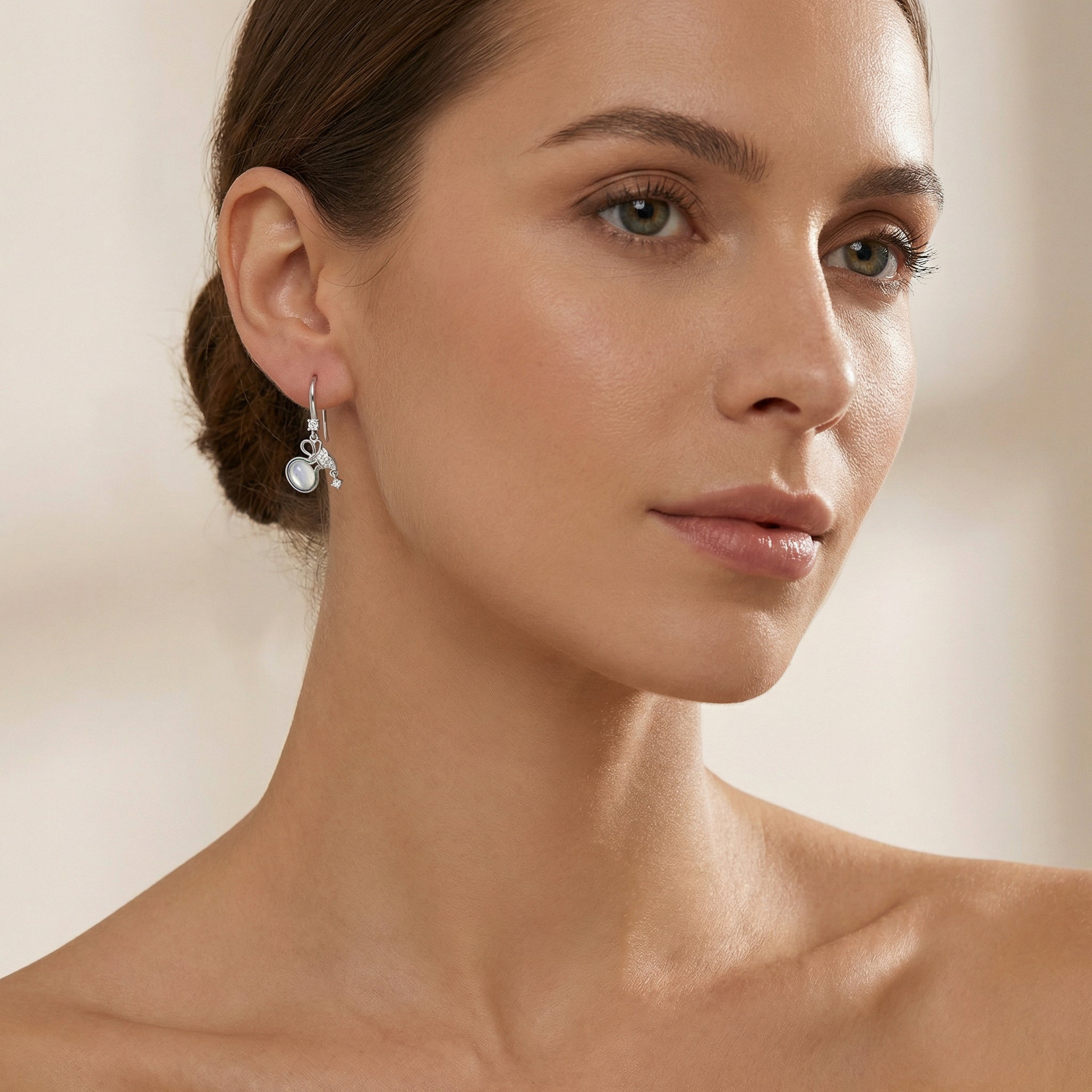 925 Sterling Silver Elegant Silver Bow Drop Earrings with Milky Moonstones and Sparkling Accents