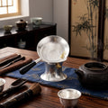 Pure 999 Fine Silver Hand-Hammered Silver Tea Strainer Set with Brass-Toned Fish Accents and Black Handle - Handicraft