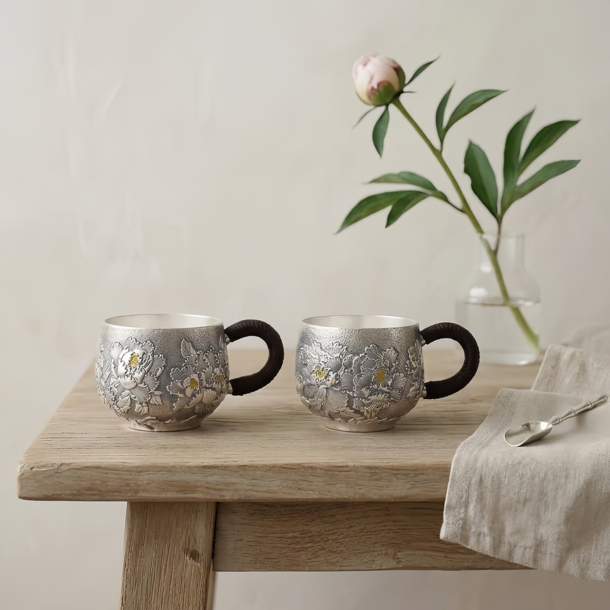 Pure 999 Fine Silver Elegant Handcrafted Silver Teacups Featuring Detailed Peony Relief and Traditional Woven Handles - Handicraft