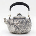Pure 999 Fine Silver **Title:** Antique  Dragon Teapot with Intricate Carvings and Black Ribbed Handle-Fine large teapot - Handicraft