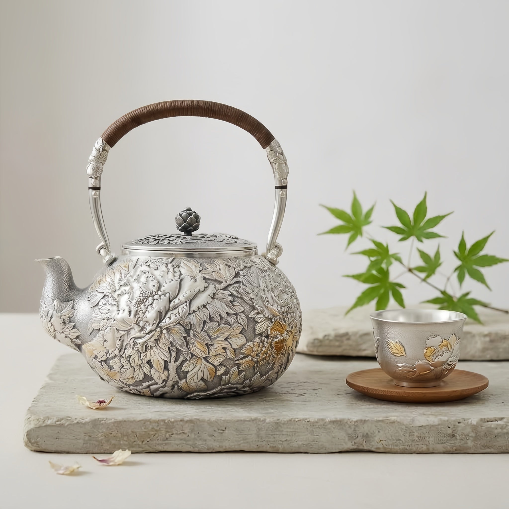 Pure 999 Fine Silver Handcrafted Silver Teapot with Intricate Floral Relief and Rattan-Wrapped Handle - Handicraft